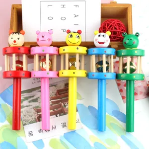 Wooden baby rattle toys with cute cartoon animal heads and metal bells for early education.