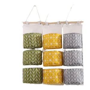 Borsa di stoccaggio da appendere alla parete con 3 strati e tasche multiple per la porta.