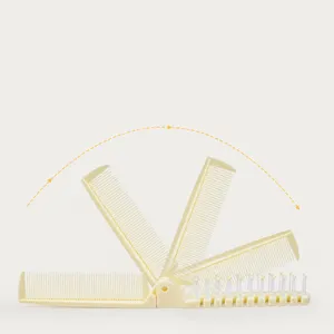 Pliable peigne portable avec dents de massage double usage et rotation de 180 degres pour voyages.