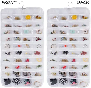Double sided hanging jewelry organizer with clear PVC pockets for earrings, necklaces and accessories.