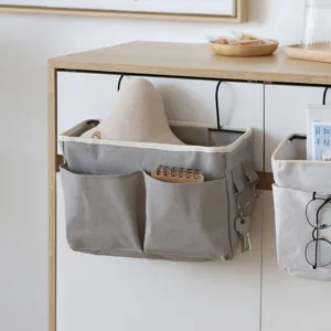 Bolsa de almacenamiento colgante de cabecera de algodón y lino organizador con bolsillos.