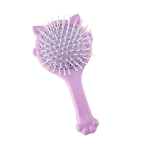 Jolie brosse à cheveux violette avec coussin d'air et picots pour un coiffage quotidien.