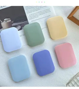 Portable 2-in-1 folding makeup mirror and comb for students, compact pocket size for travel.
