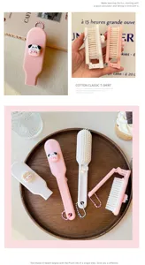 Mini brosse à cheveux pliante rose portable peigne de massage souple pour les femmes