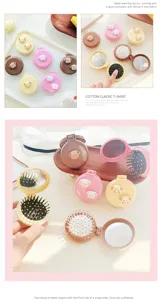 Portable cute puppy folding mirror comb 2-in-1 compact travel makeup brush with massage cushion.