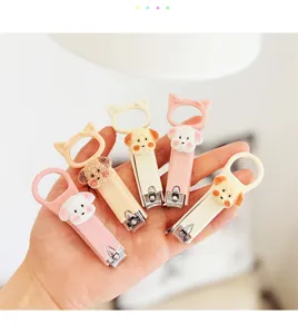 Cute puppy nail clippers set with plush cartoon animal decor, portable student manicure tool.