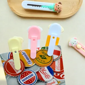 Cúter lindo de perro estilo crema abridor de paquetes portátil para manualidades