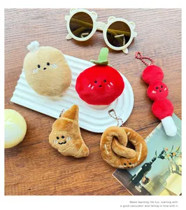 Detailed view of cute cartoon food plush pendants, soft keychain accessories for bags and keys.