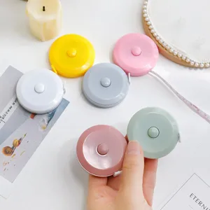 Mini cinta metrica retractil portatil para costura, medicion corporal, bonitos colores pastel.
