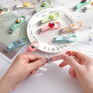 Cute cartoon folding nail clipper, portable mini manicure trimming tool for home use.