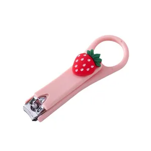 Cute pink portable nail clipper with strawberry charm, perfect for daily home manicure care.
