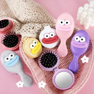 Cute cartoon big mouth air cushion comb, portable mirror hair brush for daily hair care and styling.