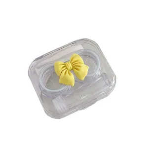 Draagbare doorzichtige contactlenshouder met schattige gele strik dubbele doos