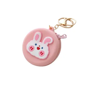 Cute round silicone coin purse with cartoon rabbit design, portable zipper pouch and keychain.