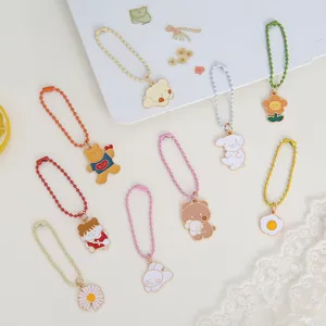 Cute cartoon metal keychain set, sweet bag pendant and key ring accessories for girls.