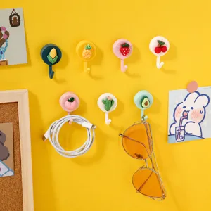 Cute cartoon adhesive wall hooks for dorm and home, fruit and plant shaped key hangers.