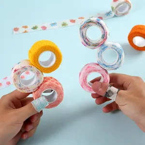 Non-woven self-adhesive finger bandages rolls for nail art protection and joint support.