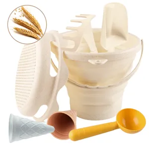 Foldable beach toy set for kids with bucket, shovel, and sand molds made of wheat straw.