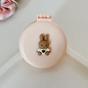 Portable foldable air cushion comb with mirror, cute mini pink hair brush for daily use.
