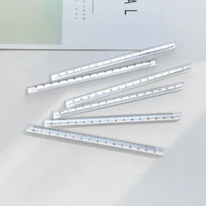 Transparent plastic triangular scale ruler detail view, clear markings for office drawing.