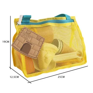 Kids beach toys set in yellow mesh bag with shovel and bucket, portable outdoor sand tools.