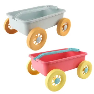 Kids beach wagon toy set with large wheels and handle, perfect for seaside sand digging and play.