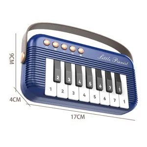 Portable mini piano toy for kids, early education musical instrument with strap and keys.