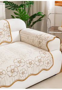 Chenille non-slip sofa cover with elegant floral jacquard pattern and chic scalloped edge.