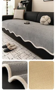 Detailed view of the plush grey sofa cover featuring soft fluffy texture and non-slip backing.