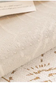 Chenille anti-slip sofa mat fabric detail closeup showing textured anti-slip silicone dots.