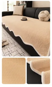 Detailed view of the thickened plush sofa cover with anti-slip backing and wavy edge design.