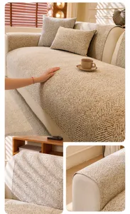 Detailed close-up of textured sofa cover, premium jacquard fabric with elegant herringbone pattern.