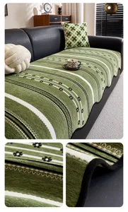 Green striped jacquard sofa cover detail showing premium fabric texture and neat edge binding.