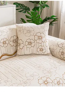 Chenille anti-slip sofa pad with elegant floral jacquard design, perfect home decor.