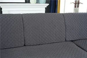 Dark grey quilted sofa cushion cover, modern minimalist anti-slip fabric sofa cover detail.