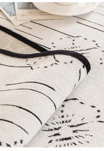Close-up detail view of minimalist chenille anti-slip sofa cushion fabric texture.