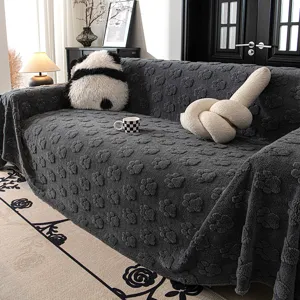 Dark grey plush sofa cover with cute paw print texture, soft chenille slipcover for living room.