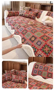 Vista dettagliata della fodera per divano jacquard geometrica boho con frange, stile etnico.