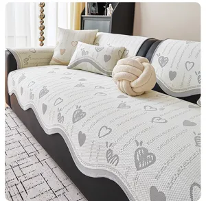 Cream style ice silk sofa cushion detail, anti-slip cooling cover with cute heart patterns.