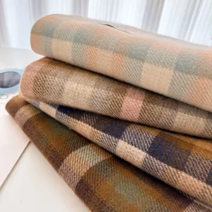 Cozy winter plaid scarf for women, retro thick warm tassel shawl with stylish checkered design.