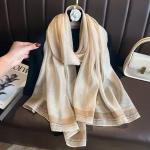 Elegant long striped scarf detail, lightweight imitation silk shawl for women, stylish beige item.