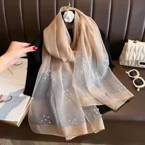 Elegant sheer chiffon scarf for women featuring delicate pearl and rhinestone floral designs.
