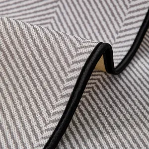 Cooling ice silk sofa mat featuring modern wave pattern and anti-slip backing for home.