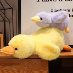 Cute yellow duck plush toy soft sleeping pillow cute stuffed animal doll for kids home decor.