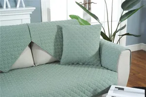 Modern minimalist washed sofa cover, plain cotton non-slip sofa cushion in light green.