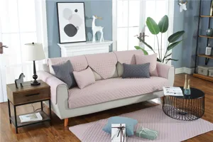 Detailed view of modern minimalist quilted sofa cover, washable non-slip fabric cushion.
