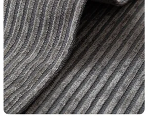 Detailed close-up of grey striped chenille fabric showing soft plush texture and modern lines.
