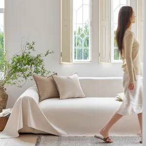 Housse de canape en chenille et plaid pour salon, quatre saisons style minimaliste.