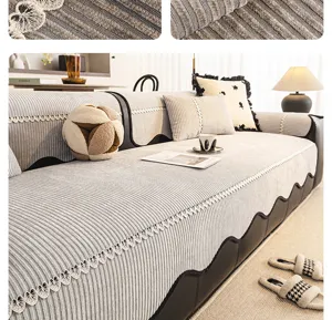 Modern grey striped sofa cover with delicate lace trim for living room home decor.