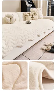 Plush sofa cover detail view showing soft warm cream fabric and anti-slip silicone backing.